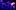 Solea Pfeiffer sits on Cory Jeacoma's lap, their faces touching, while dancers in a mass of tangled limbs are bathed in a blue light to their left.